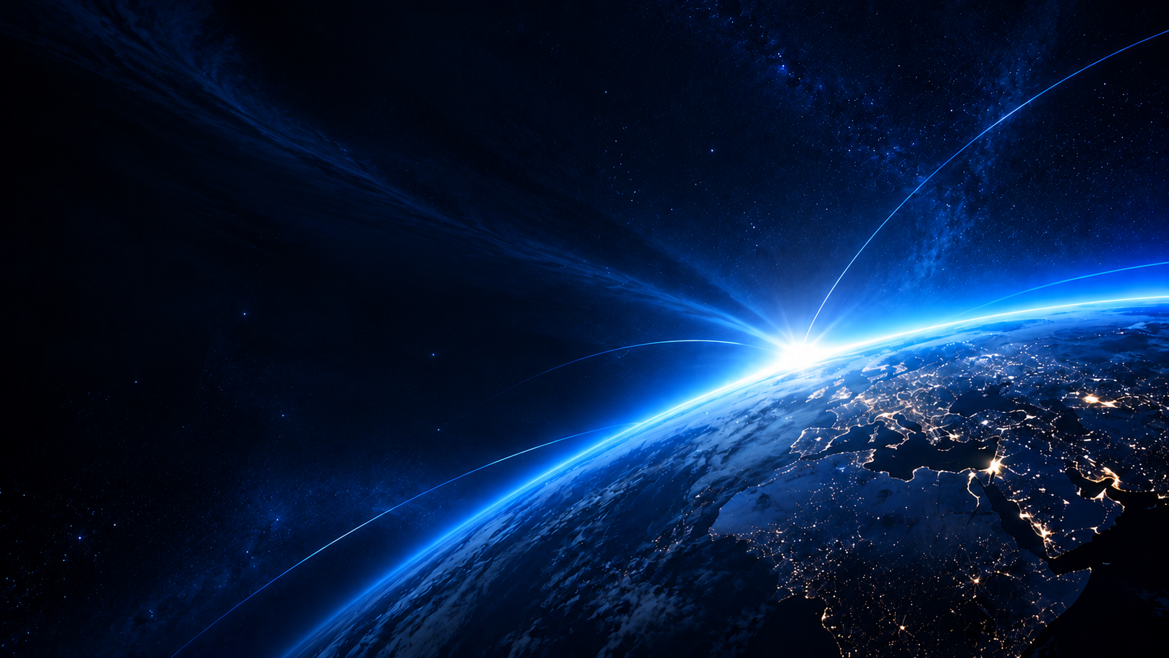 Earth at night from space with glowing blue orbital light arcs over the horizon